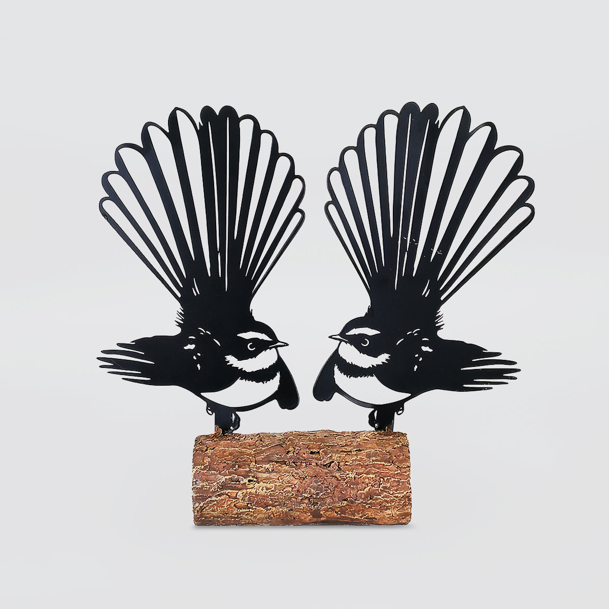 Birds Sitting On Logs Scuplture