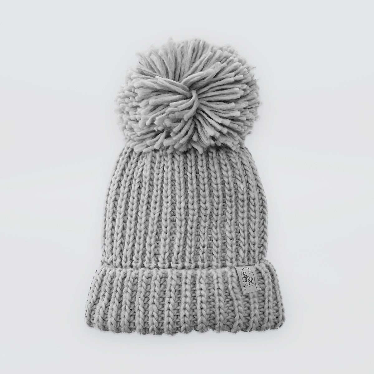 Knitted Hats With Pompoms