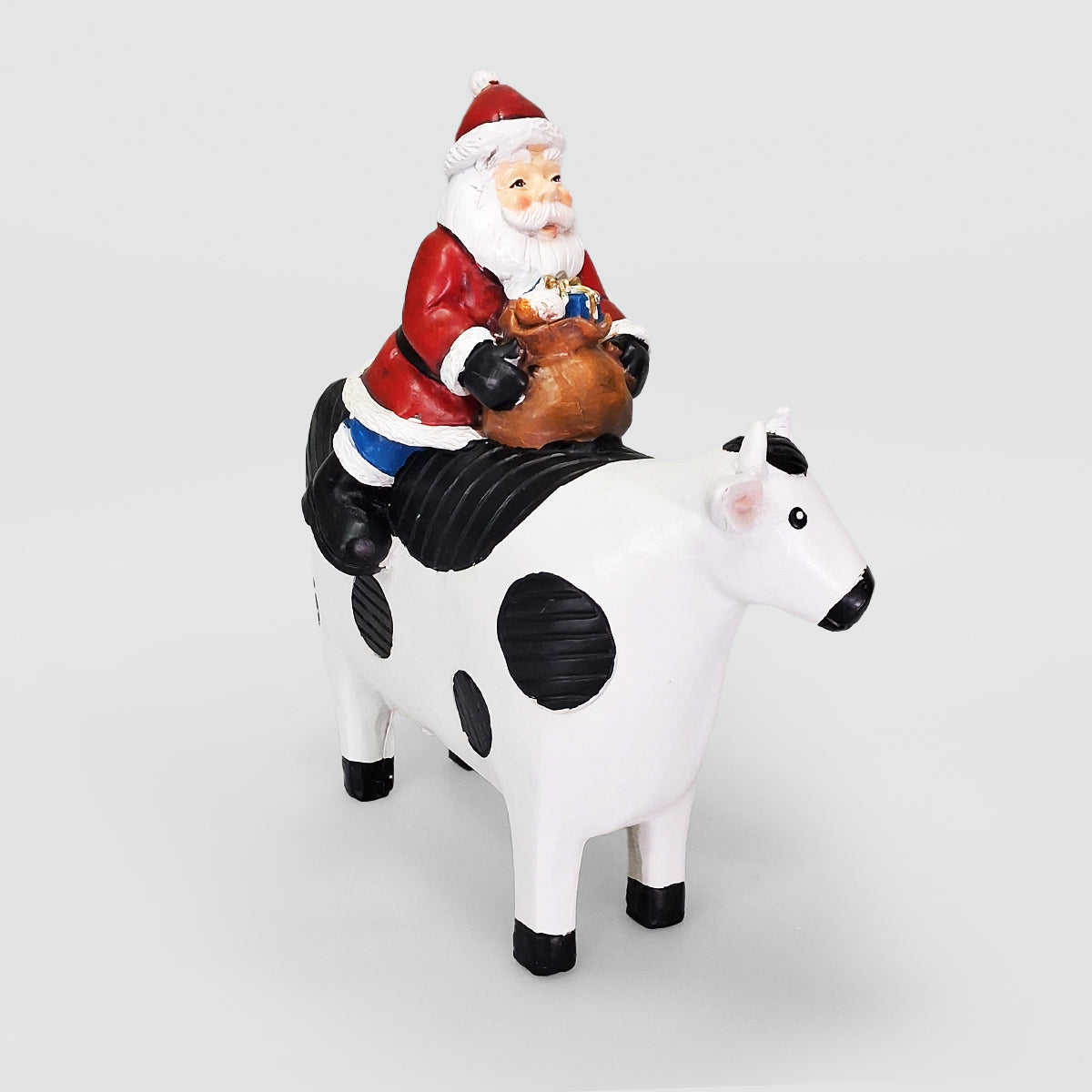 Ceramic Santa On A Cow Christmas Decor
