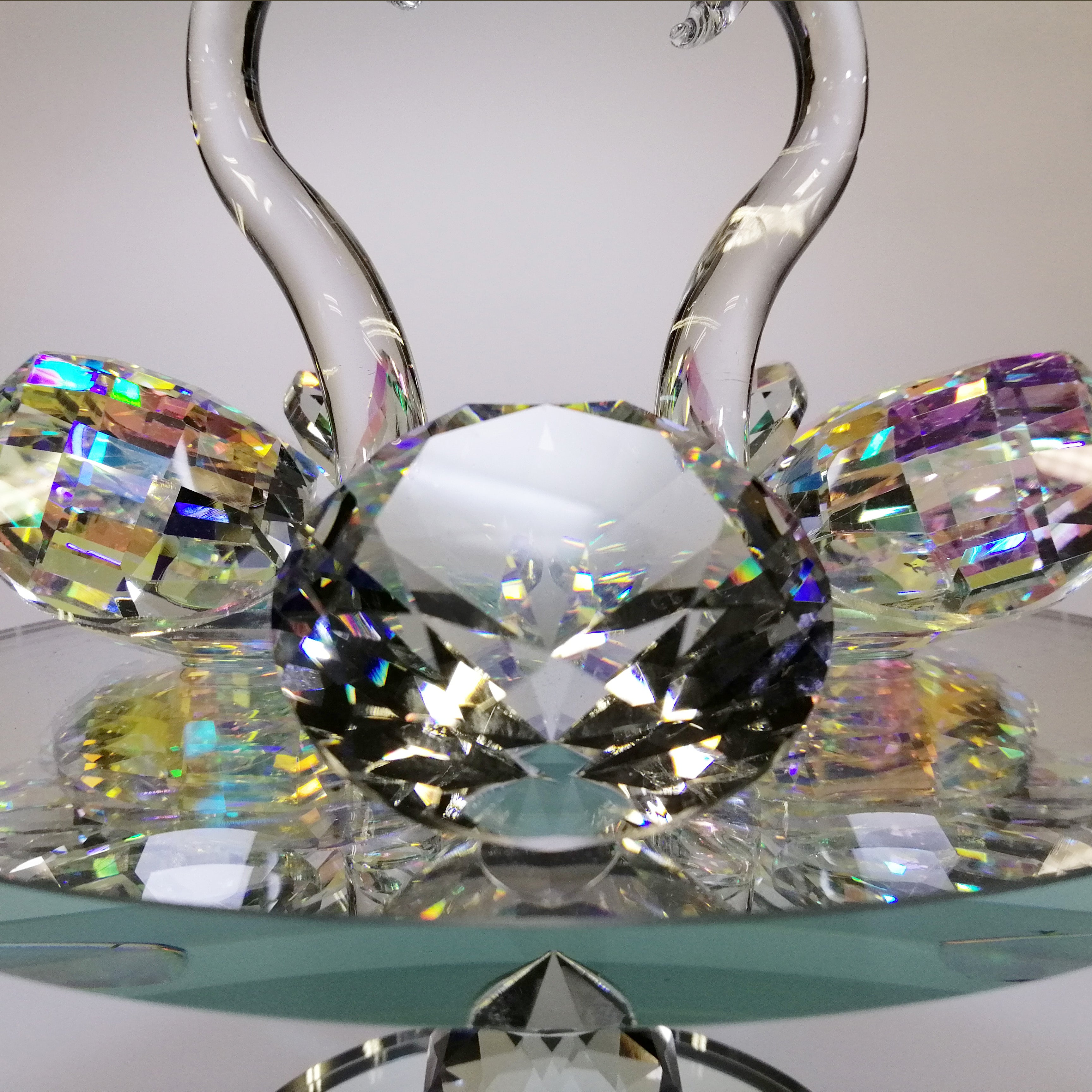 Large Iridescent Cut Glass Swans with Gem on Turnable Mirror Base