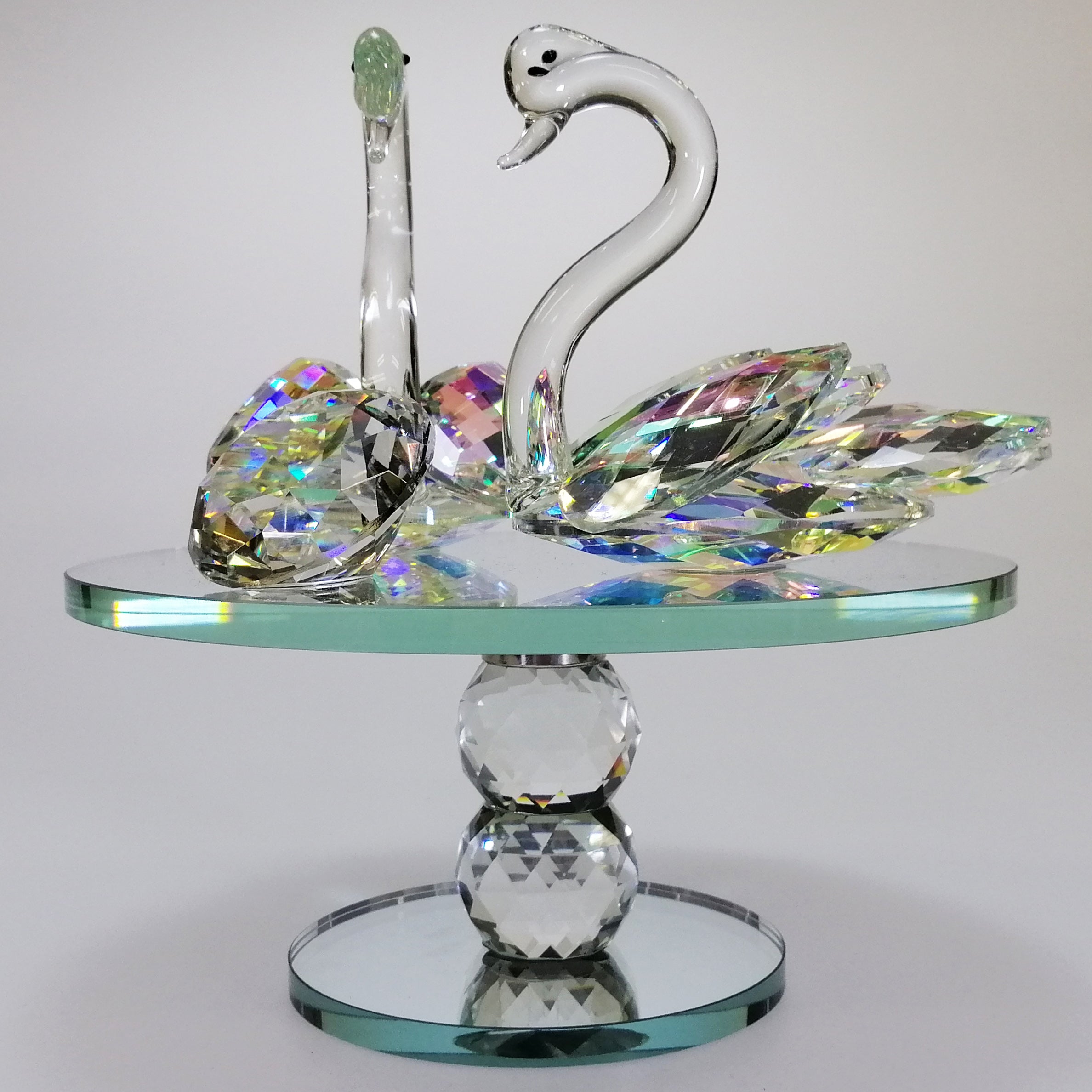 Large Iridescent Cut Glass Swans with Gem on Turnable Mirror Base