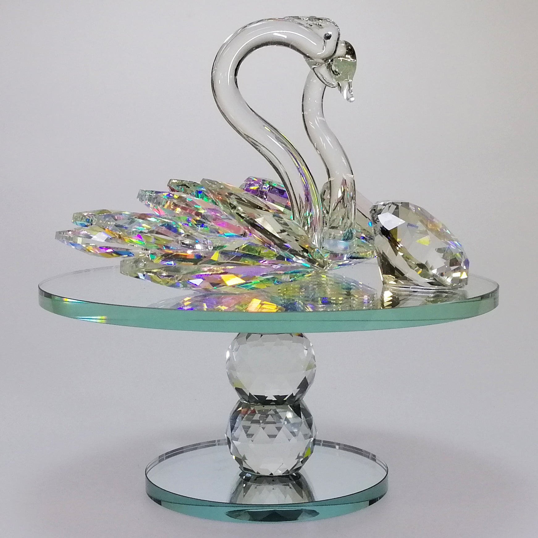 Large Iridescent Cut Glass Swans with Gem on Turnable Mirror Base