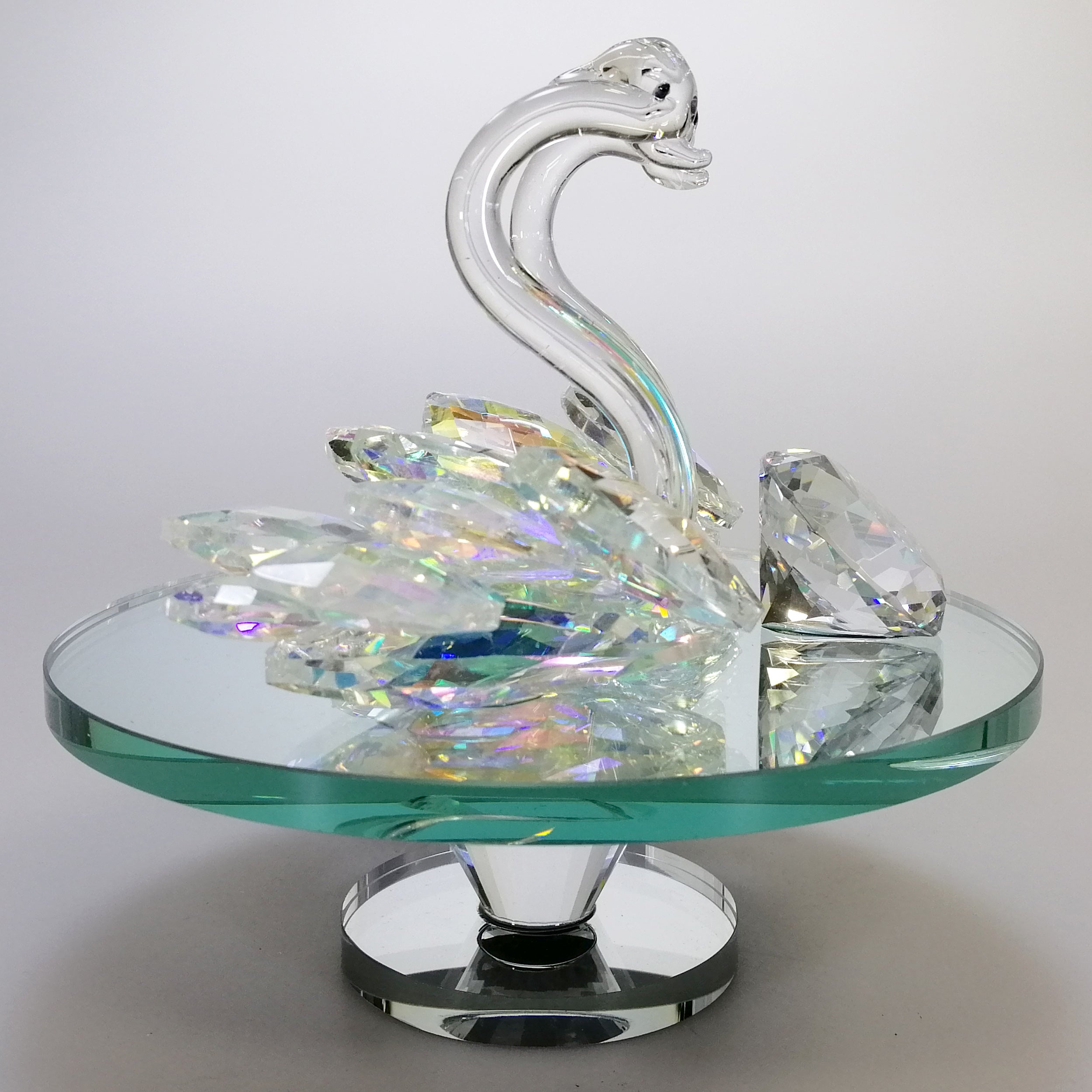 Iridescent Cut Glass Swans with Gem on Turnable Mirror Base