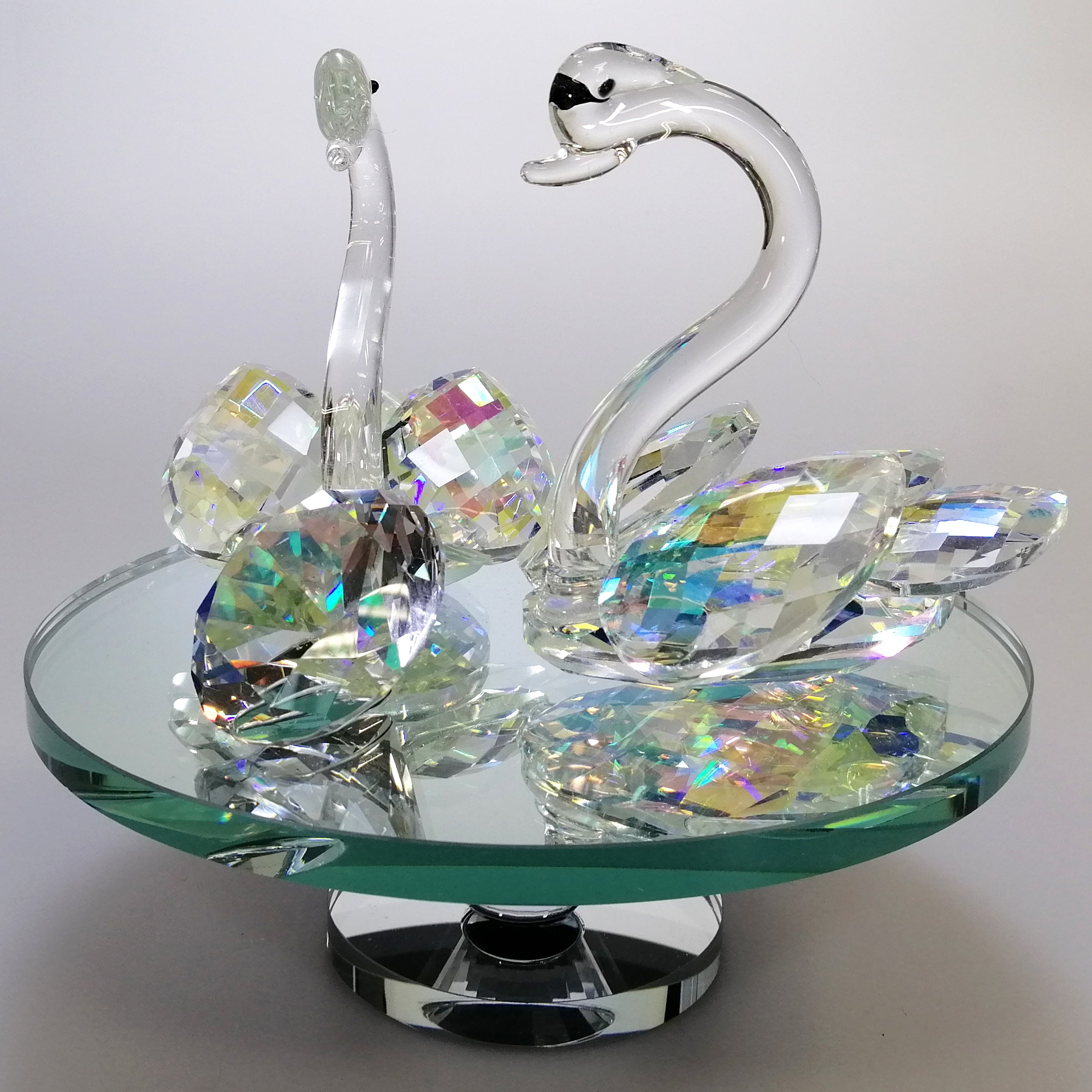 Iridescent Cut Glass Swans with Gem on Turnable Mirror Base