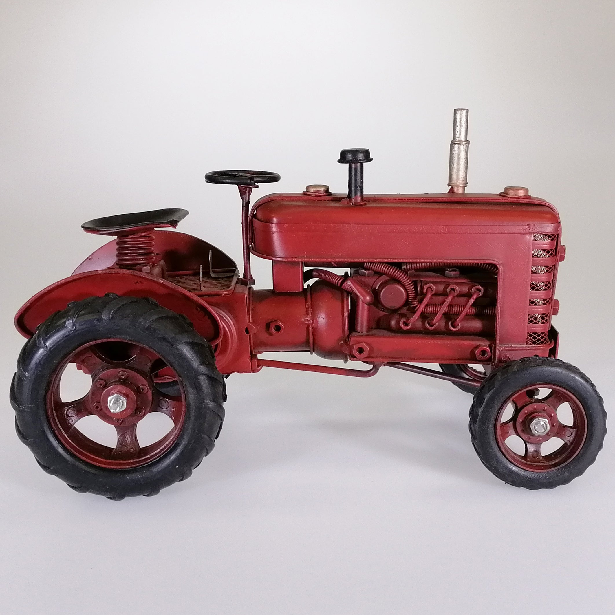 Vintage Red Tractor Sculpture