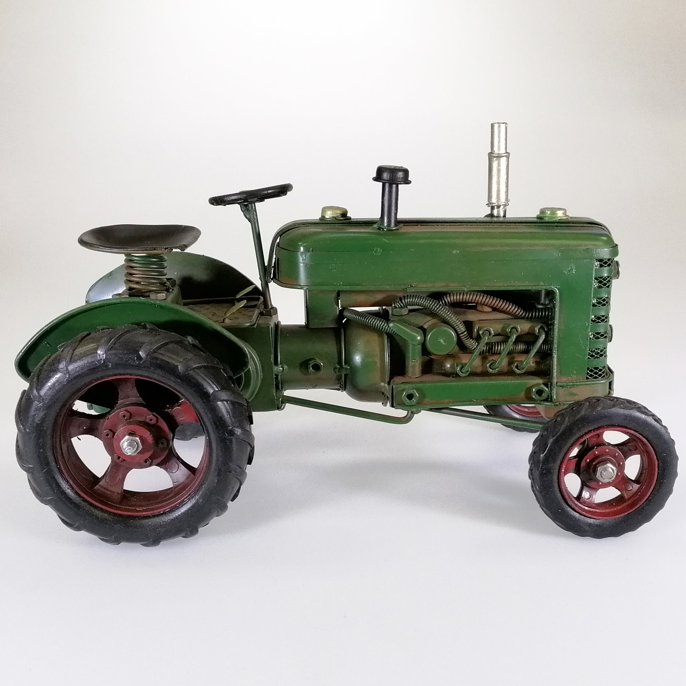 Vintage Green Tractor Sculpture