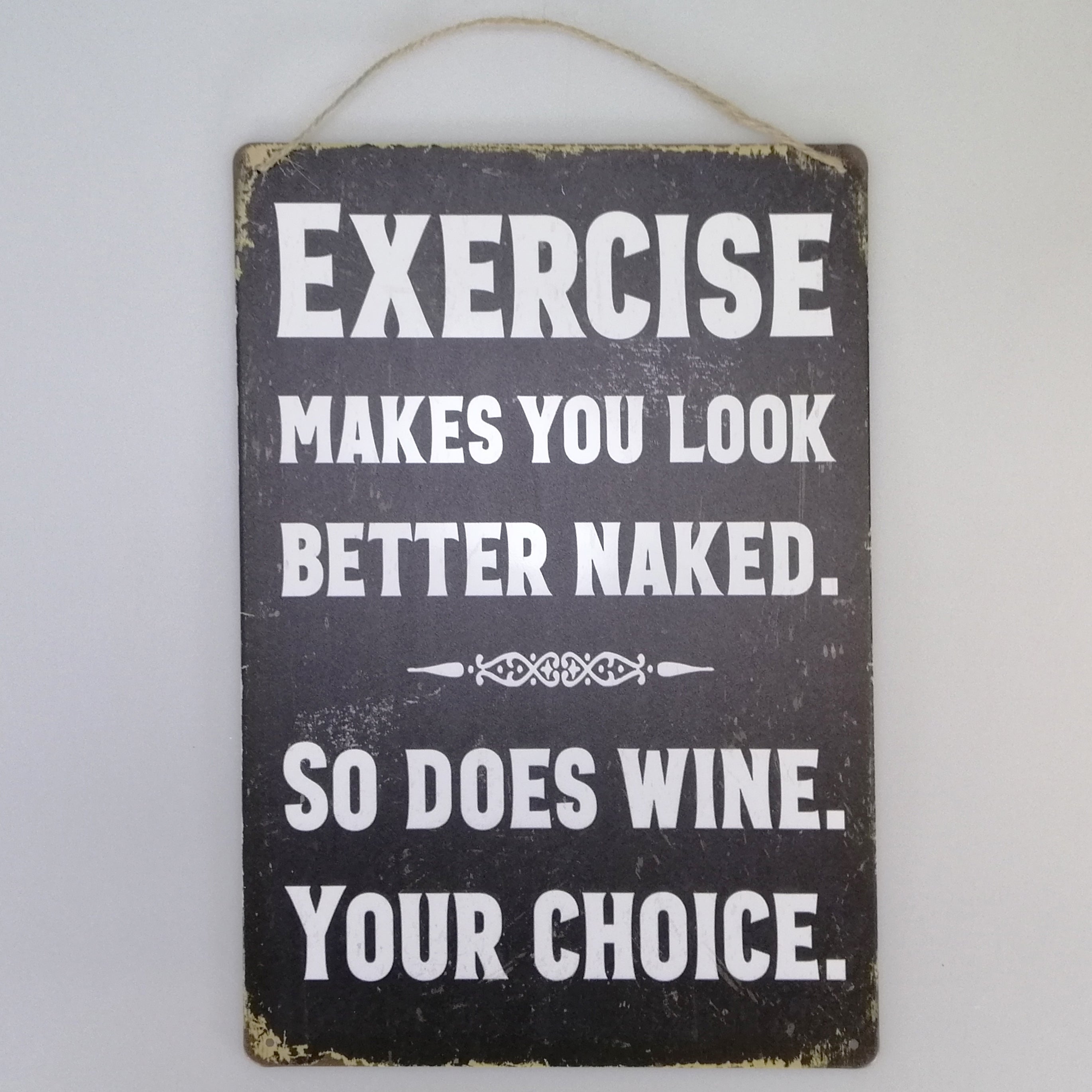 Exercise Makes You...' Tin Sign