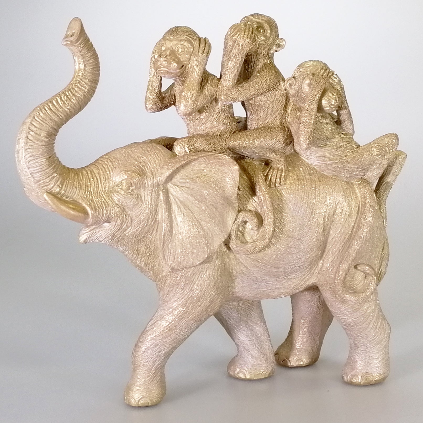 Painted Gold Elephant With monkeys