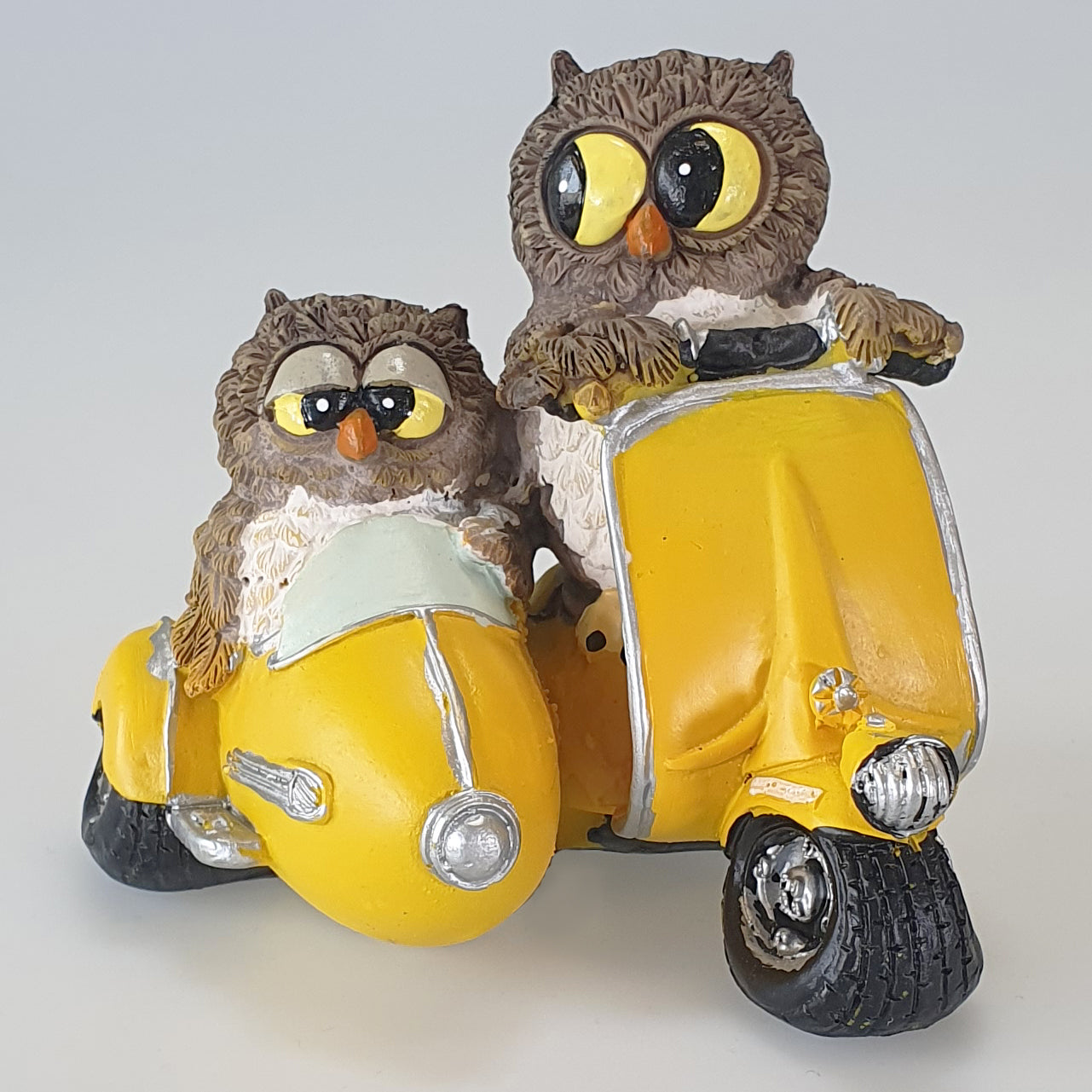 Owl Duo On Yellow Moped Figurine