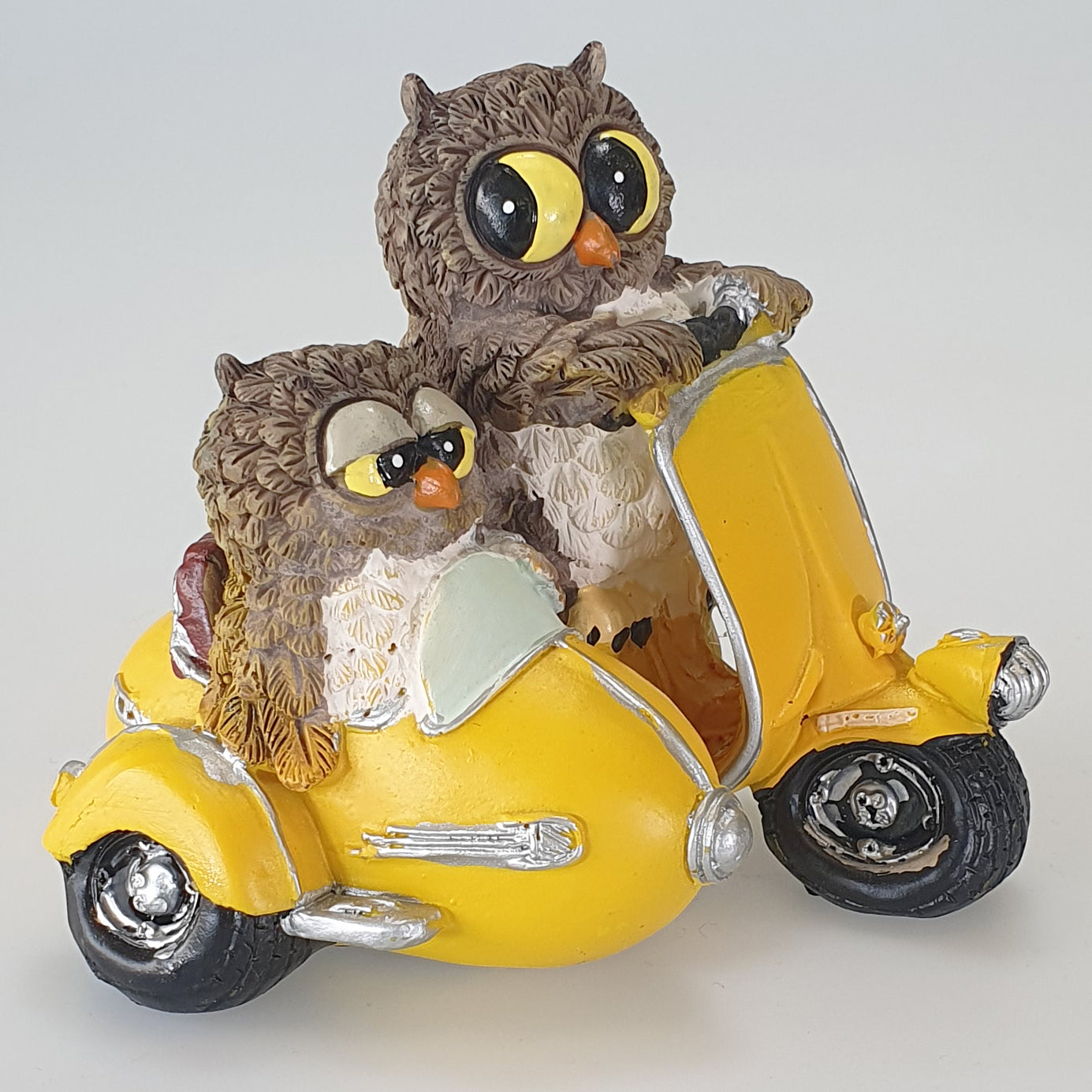 Owl Duo On Yellow Moped Figurine