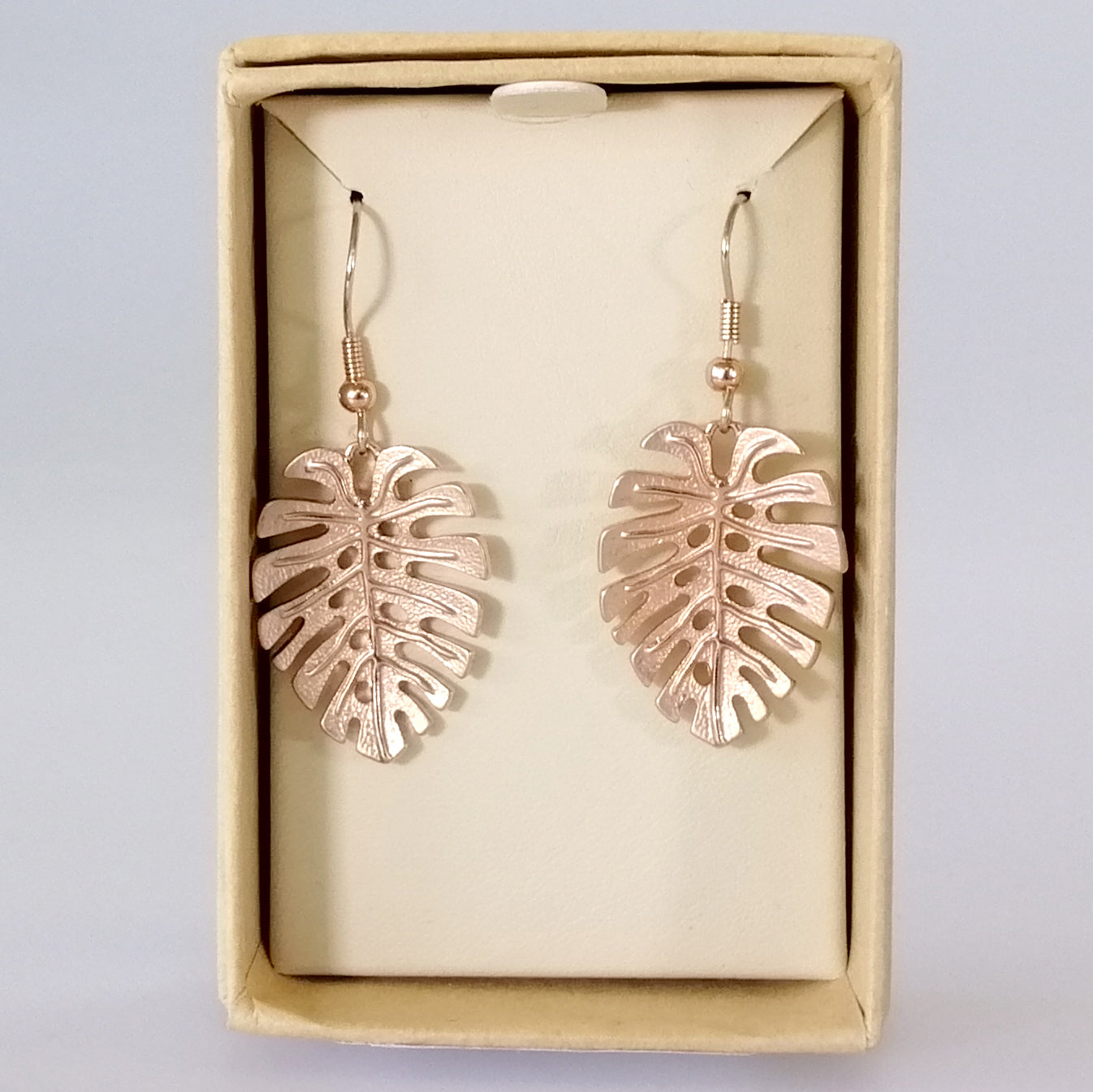 Gold palm hot sale leaf earrings