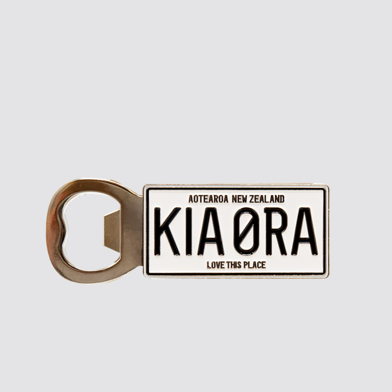 Bottle opener with 'KIA ORA' text on a white background