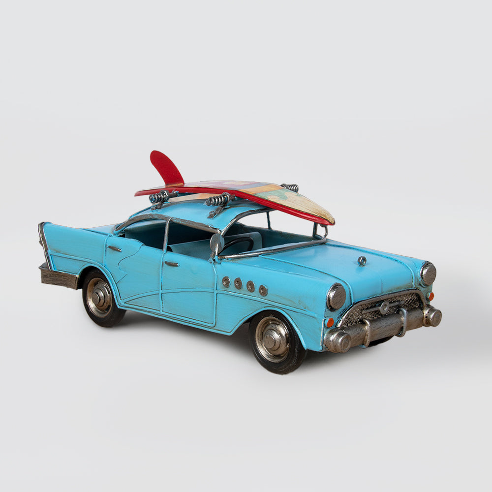 Blue Car With Surfboard