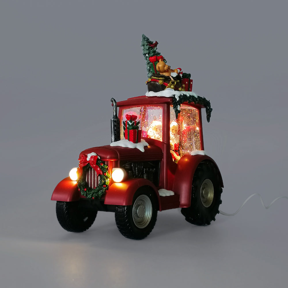 Santa In a LED Red Tractor