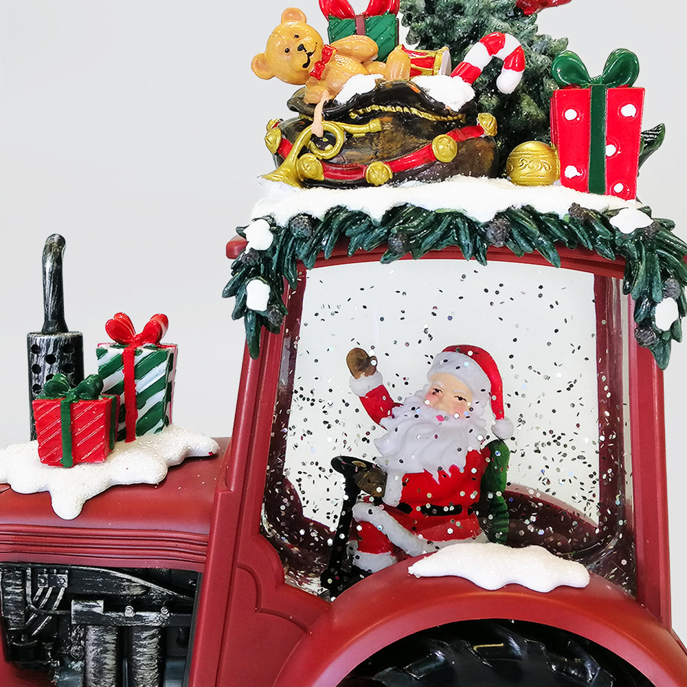 Santa In a LED Red Tractor