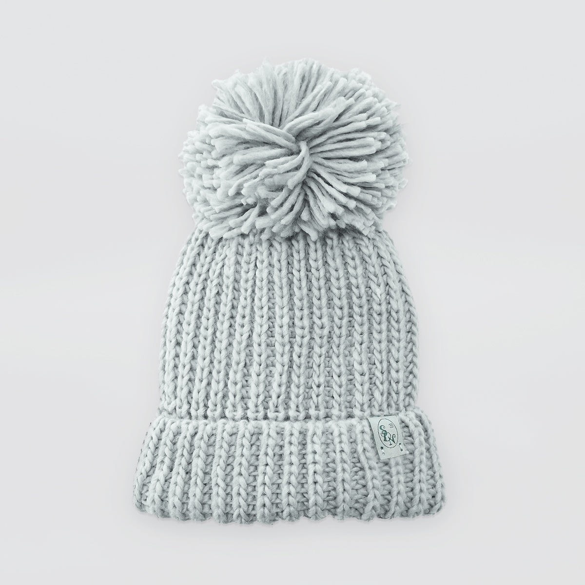 Knitted Hats With Pompoms