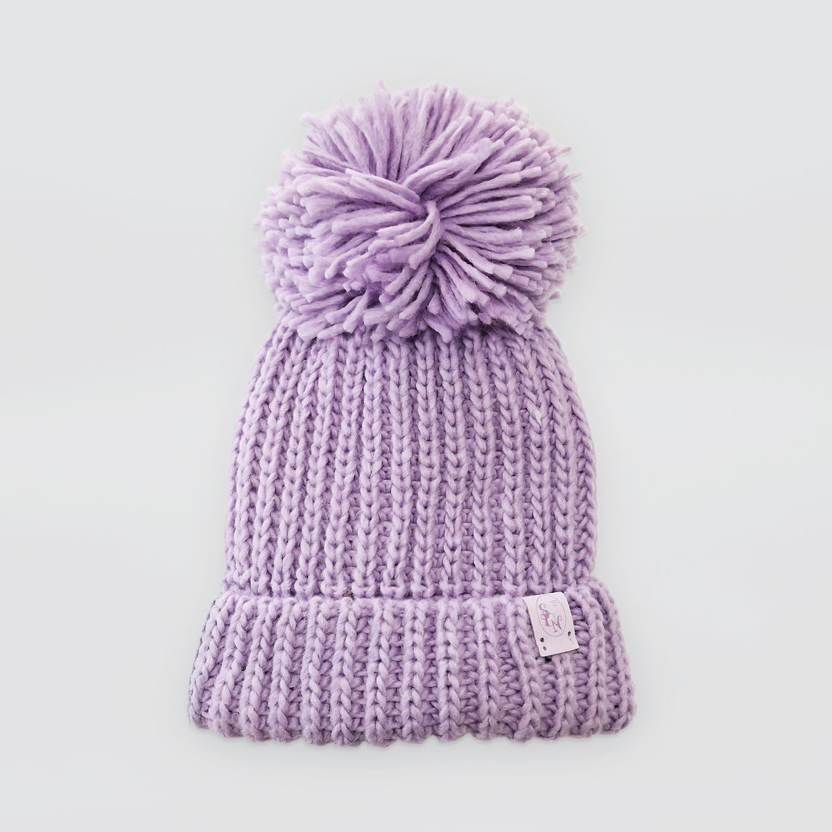 Knitted Hats With Pompoms