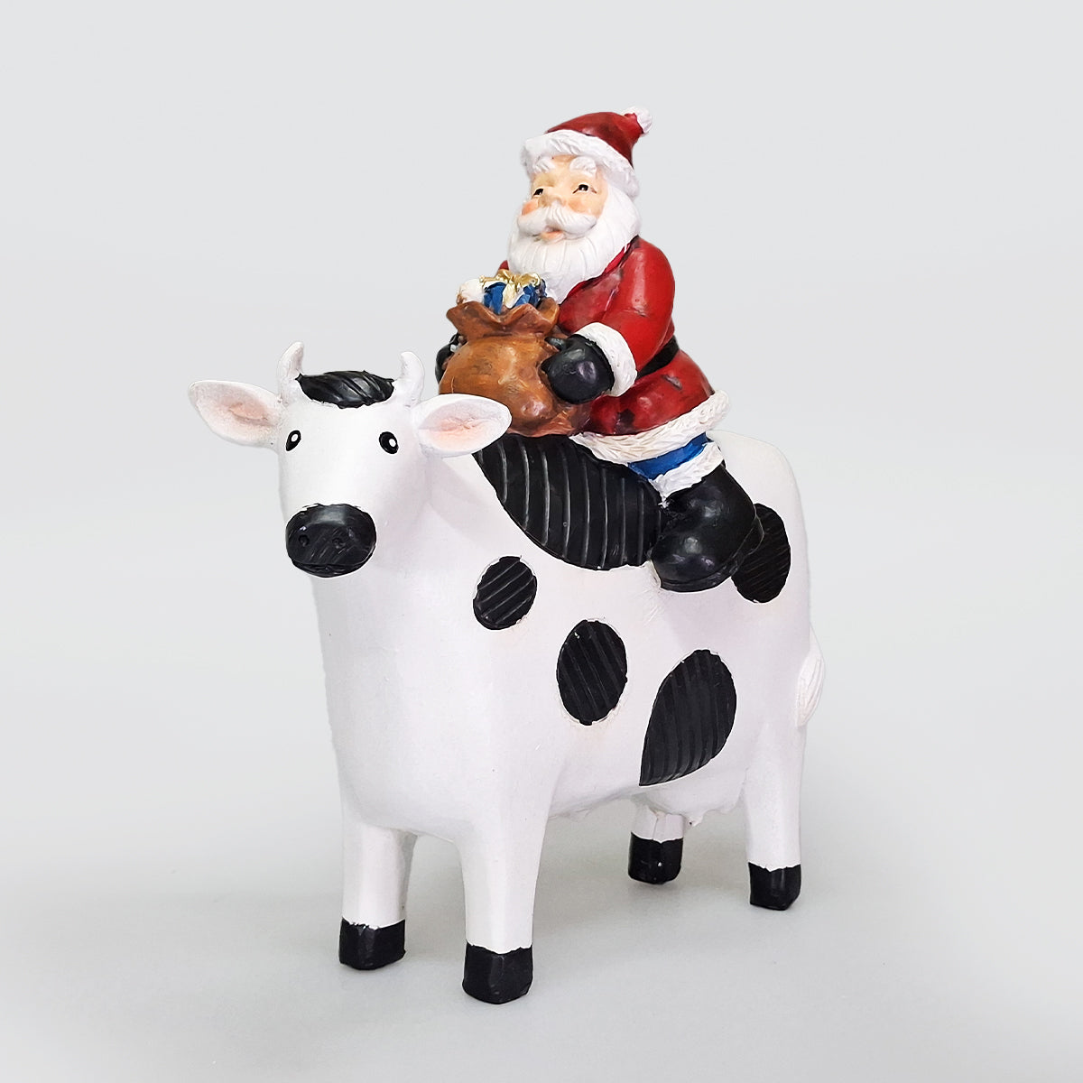 Ceramic Santa On A Cow Christmas Decor