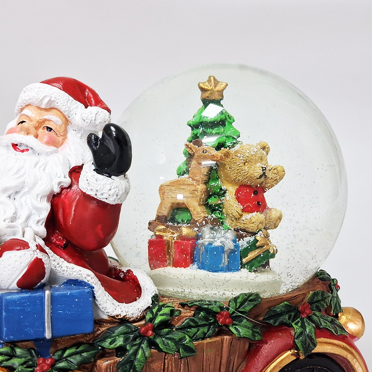 Santa With LED Snow Globe In Car