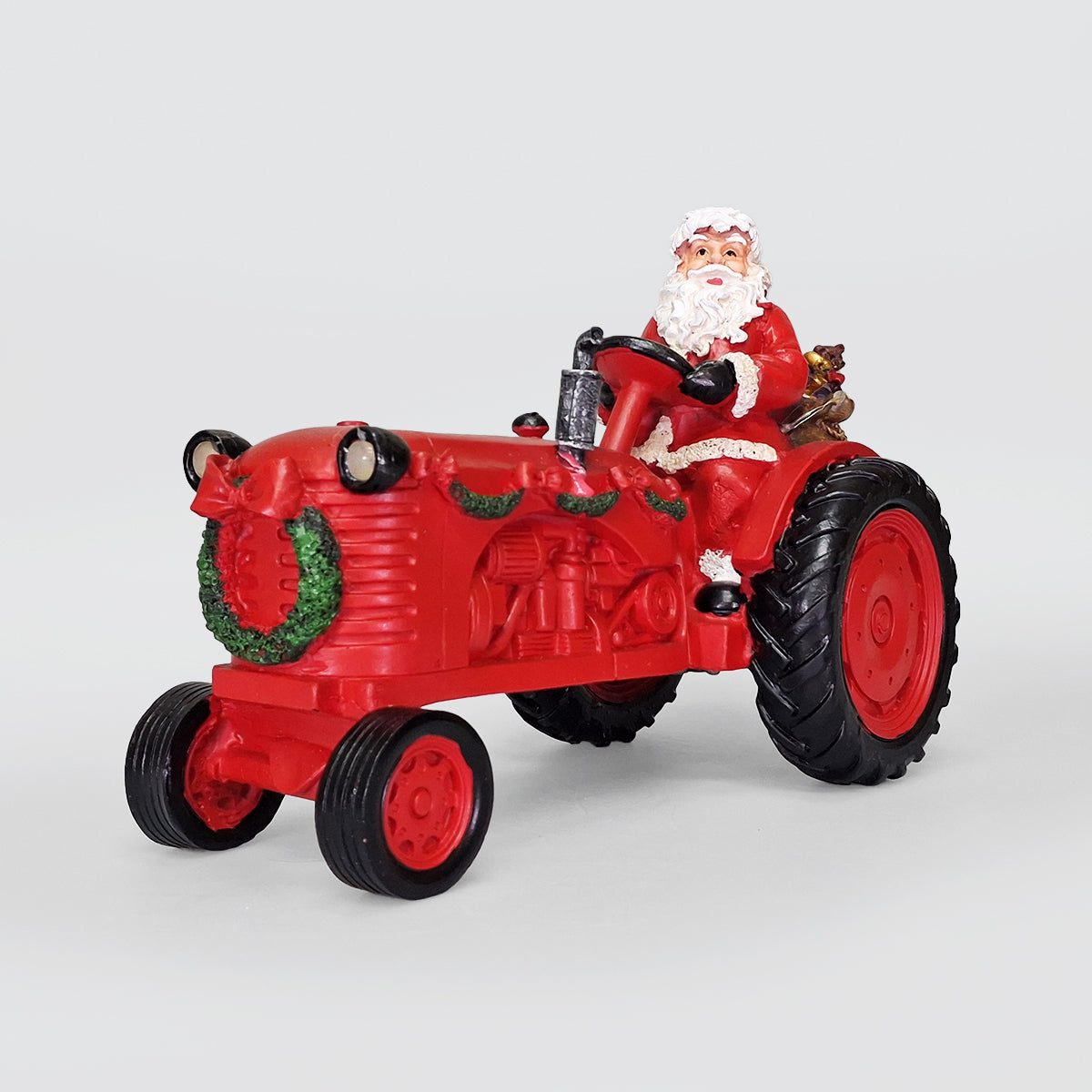 Santa In A Christmas Tractor Decor