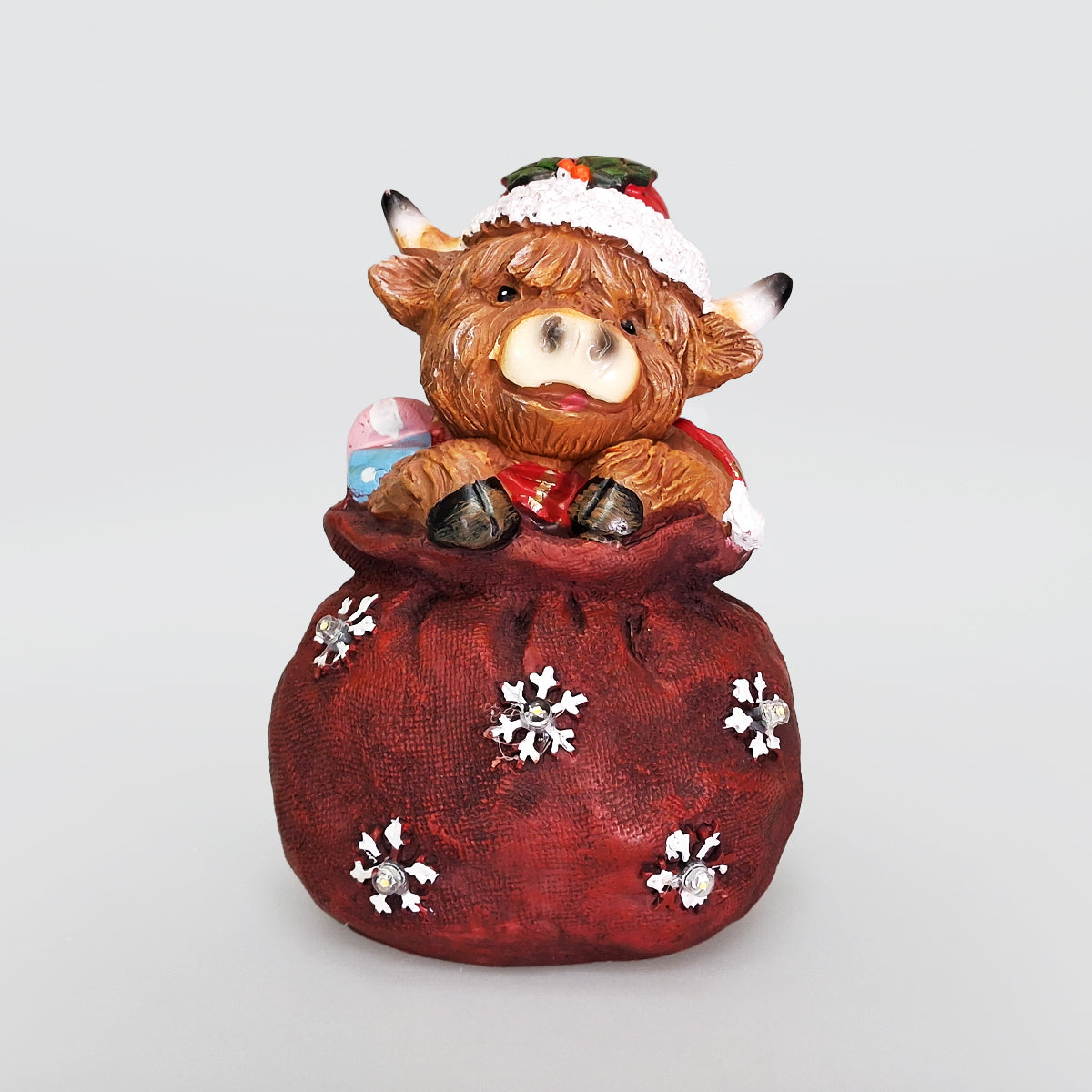 Christmas Highland Cow In A Sack - LED