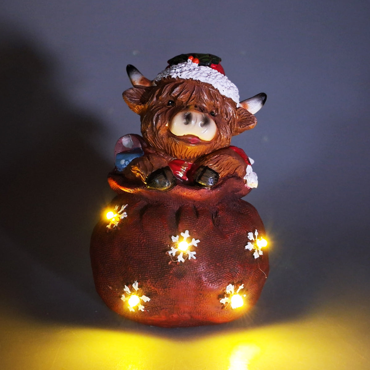 Christmas Highland Cow In A Sack - LED