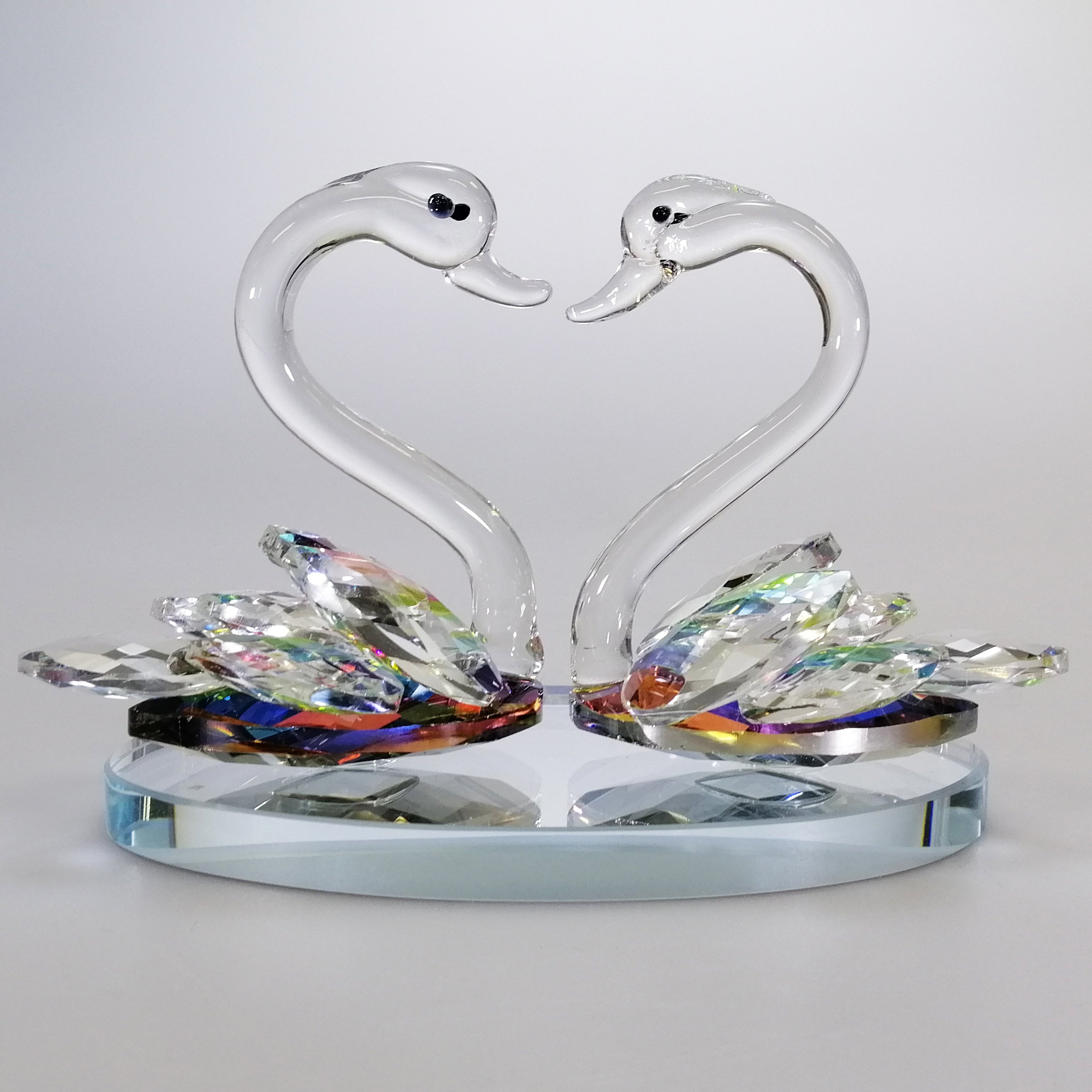 Iridescent Cut Glass Swans on Mirror Base