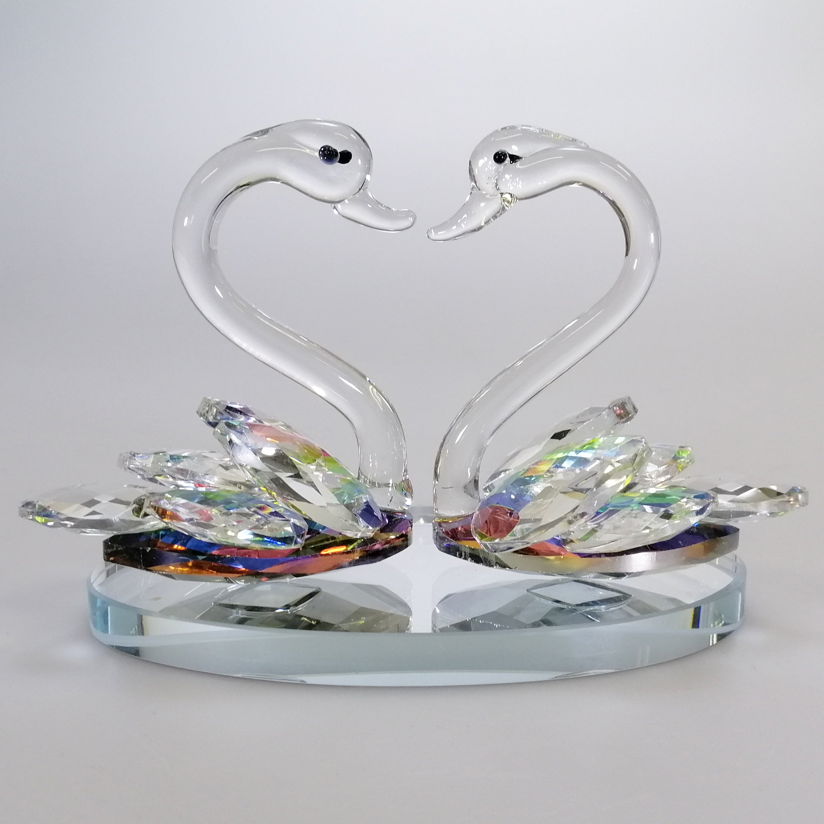 Iridescent Cut Glass Swans on Mirror Base