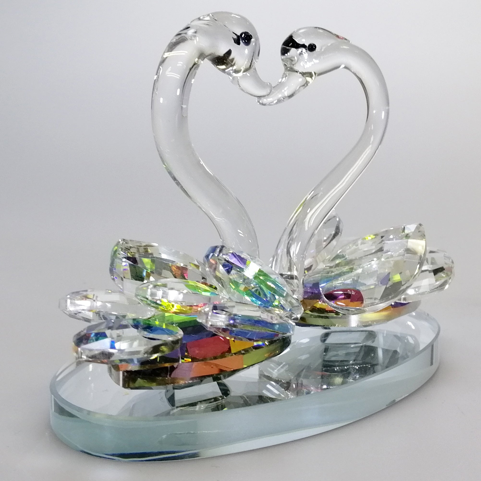 Iridescent Cut Glass Swans on Mirror Base