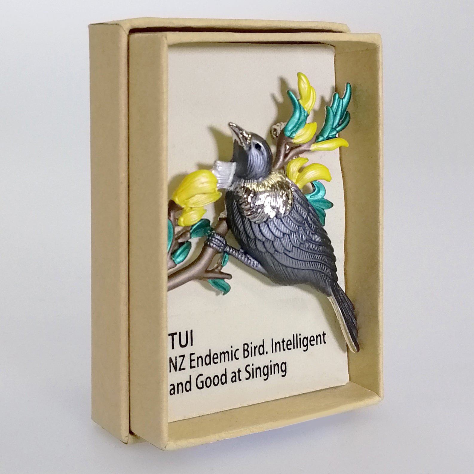 Kiwicraft - Grey Tui on Kowhai Brooch