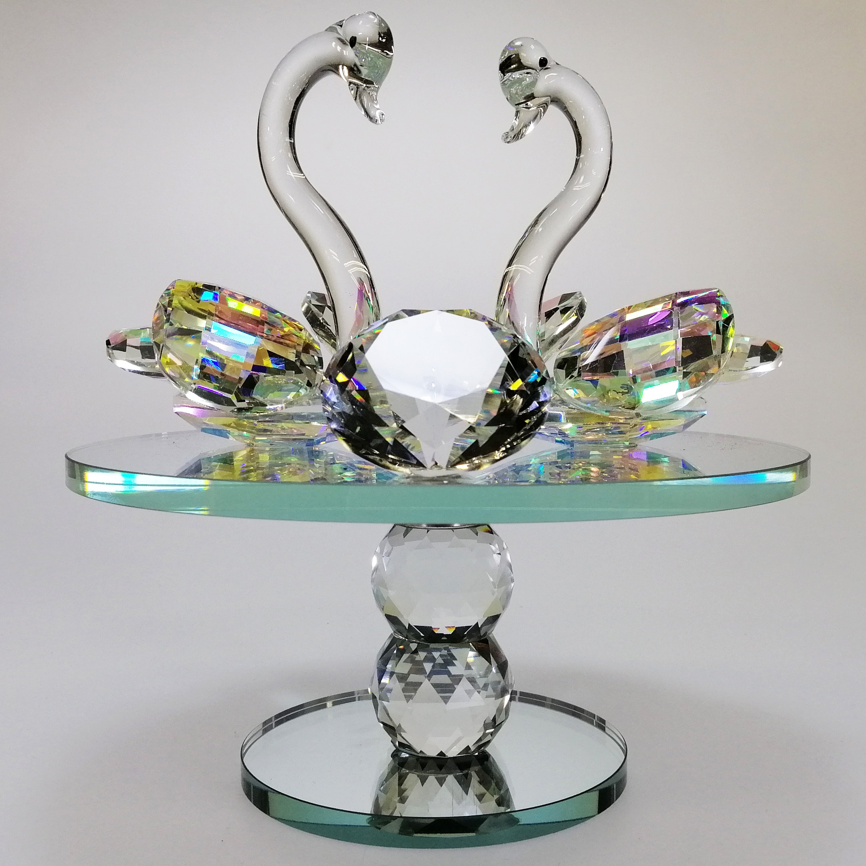Large Iridescent Cut Glass Swans with Gem on Turnable Mirror Base
