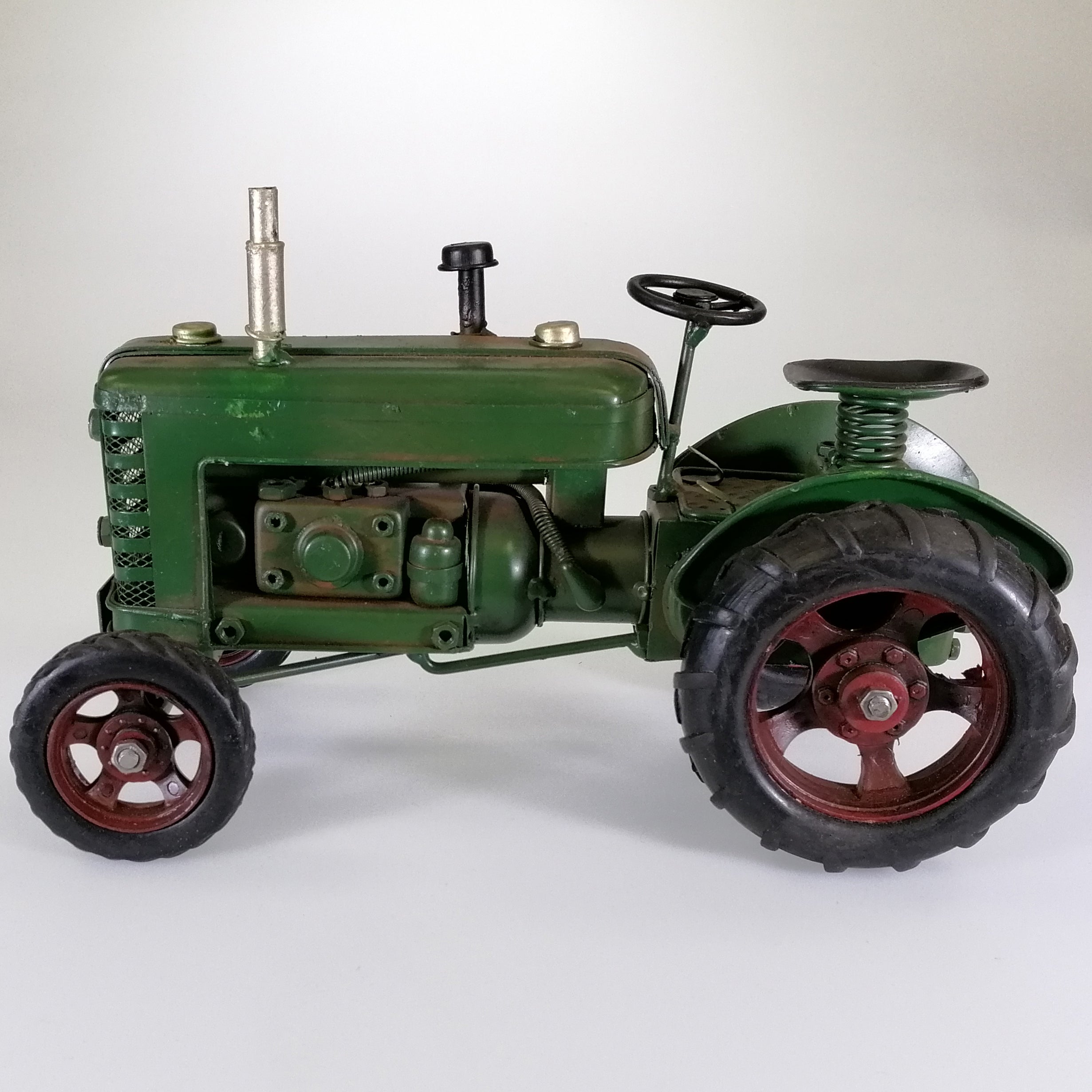 Vintage Green Tractor Sculpture